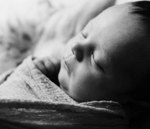 Black & White Newborn photo by Jayne Poole for all your newborn artistic photography requirements, based in Great Torrington, near Bideford, Barnstapple, Ilfracombe, Roundswell, South Molton, Crediton and Holsworthy a short distamce from the North Devon Coast